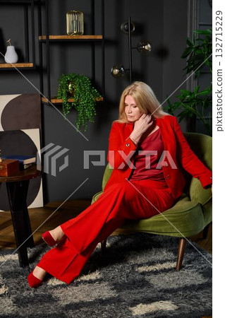 business strategist in modern setting, professional in stylish lounge with thoughtful pose business strategist in modern setting, professional in stylish lounge with thoughtful pose 132715229