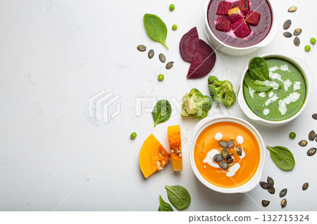 Three bowls colourful vegetable soups white background healthy diet cooking detox copy space Three bowls colourful vegetable soups white background healthy diet cooking detox copy space 132715324