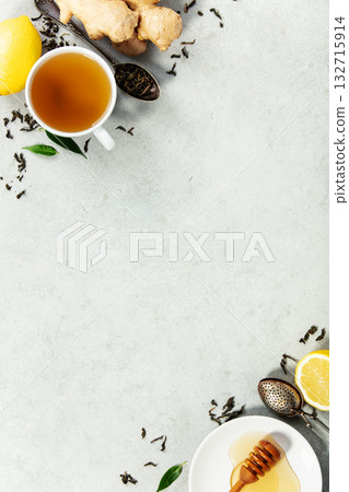 Herbal Tea with Ginger, Lemon, and Honey on Light Background 132715914
