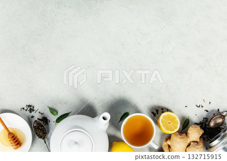 Herbal Tea with Ginger, Lemon, and Honey on Light Background 132715915