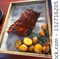 Rib meat with potatoes and rosemary 132716205