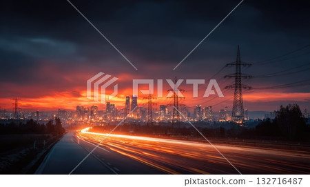 Vibrant city skyline with glowing highway lights at sunset 132716487