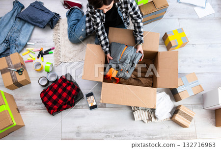 Girl Packing Cardboard Boxes And Girl Packing Cardboard Boxes Girl Packing Cardboard Boxes And Girl Packing Cardboard Boxes 132716963