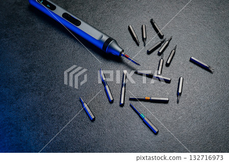 Electric mini screwdriver and several different interchangeable bits Electric mini screwdriver and several different interchangeable bits 132716973