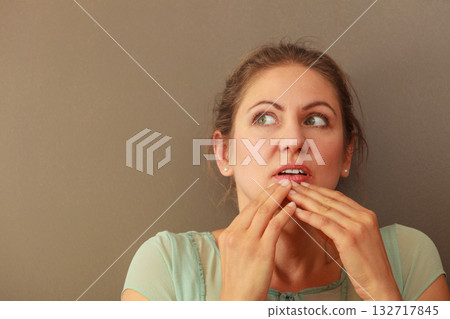 Thoughtful emotional woman in studio 132717845