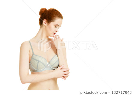 Attractive slim woman in grey matching underwear 132717943