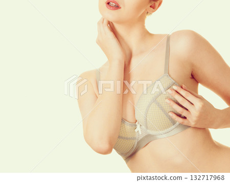 Attractive slim woman in grey matching underwear 132717968