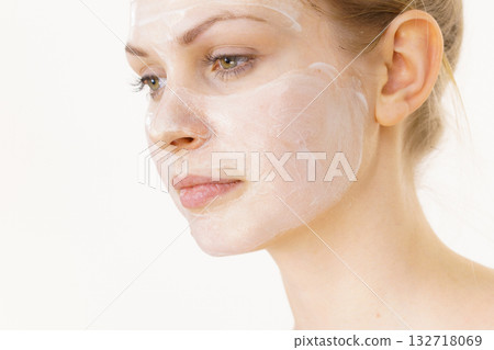 Girl with cream moisture cosmetic on face Girl with cream moisture cosmetic on face 132718069