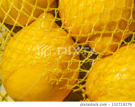 Lemon fruits in net 132719276