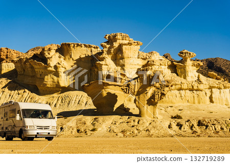 Camper car at rock formations Bolnuevo, Spain 132719289