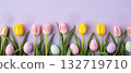 Colorful Easter eggs and tulips on pastel background 132719710