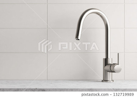 Modern Kitchen Faucet Design on Marble Countertop Against White Tiled Background Modern Kitchen Faucet Design on Marble Countertop Against White Tiled Background 132719989