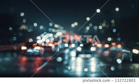 Night City Traffic Blur With Bokeh Lights and Wet Street Reflections During Rainy Evening Night City Traffic Blur With Bokeh Lights and Wet Street Reflections During Rainy Evening 132722801
