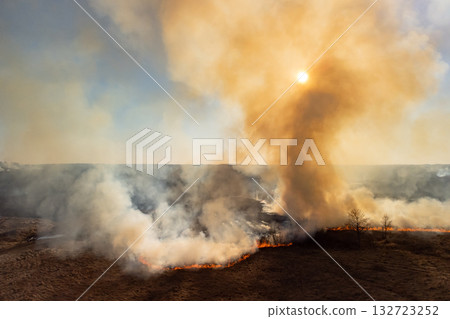 Aerial photo of wildfire in fields and forests. Big territory burning Aerial photo of wildfire in fields and forests. Big territory burning 132723252