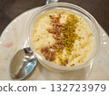 [Japan] Arabic milk pudding "Muhallabiya" served on a plate 132723979