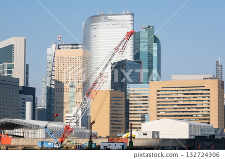 A view of the large cranes along the Sumida River and the Tsukiji Shiodome area from Kachidoki A view of the large cranes along the Sumida River and the Tsukiji Shiodome area from Kachidoki 132724306
