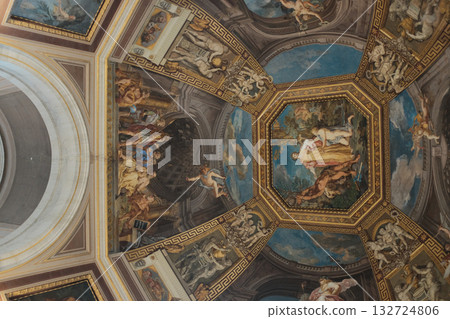 Ornate coffered ceiling with octagonal fresco panels blue and gold renaissance decoration Vatican Museums interior no people. High quality photo Ornate coffered ceiling with octagonal fresco panels blue and gold renaissance decoration Vatican Museums interior no people. High quality photo 132724806