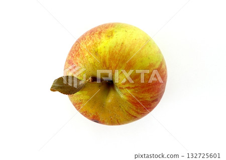 A top view of an unrelated apple on a white background A top view of an unrelated apple on a white background 132725601
