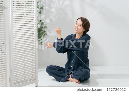 Women stretching in pajamas 132726012