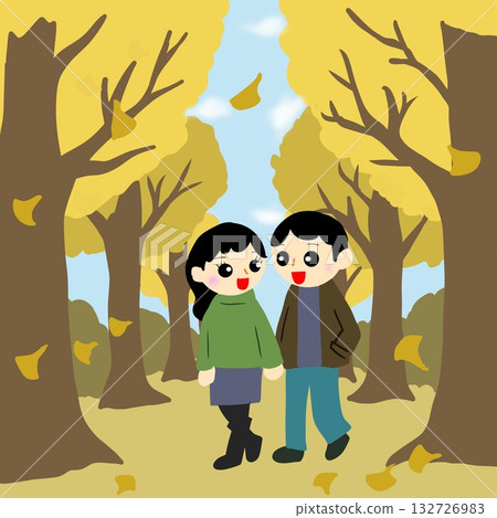 A couple walking hand in hand along a tree-lined path (ginkgo tree-lined street) with fallen leaves falling 132726983