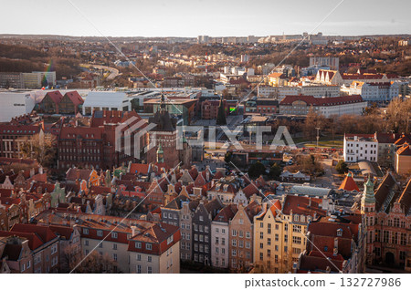 Beautiful sunset over the old town of Gdansk with City Hall and St. Mary Basilica, Poland. High quality photo 132727986