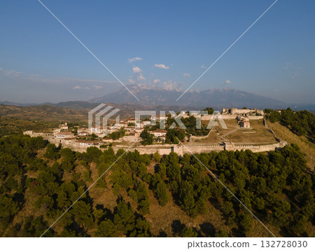 Aerial view of the old Castle of Berat and its ancient neighborhoods in sunset light, located in Albania. Photo taken with drone Aerial view of the old Castle of Berat and its ancient neighborhoods in sunset light, located in Albania. Photo taken with drone 132728030