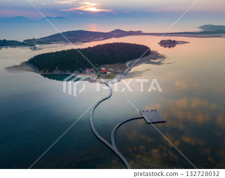 Aerial landscape photography. Fantastic morning view of St Mary's Monastery and wooden pier. Magnificent spring seascape of Narta Lagoon. Beautiful outdoor scene of Albania, Europe. 132728032