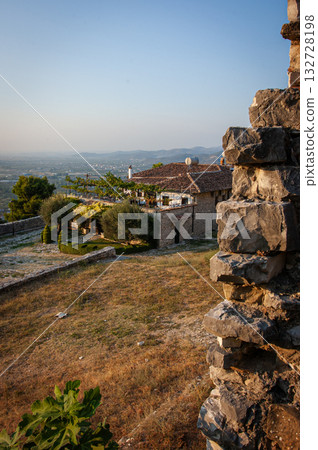 Sunset over the town of Berat on the Osum River, known for its white Ottoman houses. Also called the 'City of a Thousand Windows,' it is built against the hillside below the citadel. Sunset over the town of Berat on the Osum River, known for its white Ottoman houses. Also called the 'City of a Thousand Windows,' it is built against the hillside below the citadel. 132728198