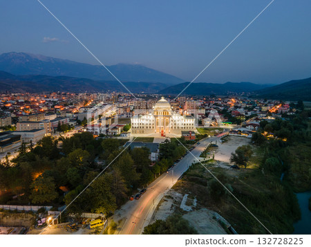 Sunset over the town of Berat on the Osum River, known for its white Ottoman houses. Also called the 'City of a Thousand Windows,' it is built against the hillside below the citadel. 132728225