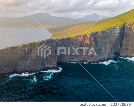 Scenic viewpoint on Traelanipa trail, overlooking dramatic basalt cliffs and vast volcanic rock formations above the ocean. Scenic viewpoint on Traelanipa trail, overlooking dramatic basalt cliffs and vast volcanic rock formations above the ocean. 132728629