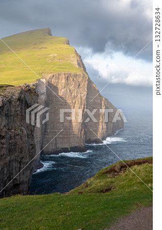 Scenic viewpoint on Traelanipa trail, overlooking dramatic basalt cliffs and vast volcanic rock formations above the ocean. Scenic viewpoint on Traelanipa trail, overlooking dramatic basalt cliffs and vast volcanic rock formations above the ocean. 132728634