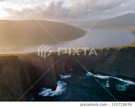 Scenic viewpoint on Traelanipa trail, overlooking dramatic basalt cliffs and vast volcanic rock formations above the ocean. Scenic viewpoint on Traelanipa trail, overlooking dramatic basalt cliffs and vast volcanic rock formations above the ocean. 132728636