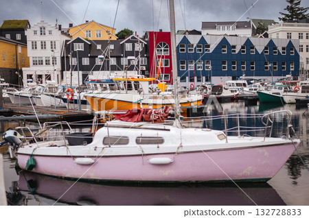 Torshawn city, the capital of The Faroe Islands, Denmark. Vestaravag harbor in Torshavn with its boats and colorful buildings. High quality photo Torshawn city, the capital of The Faroe Islands, Denmark. Vestaravag harbor in Torshavn with its boats and colorful buildings. High quality photo 132728833