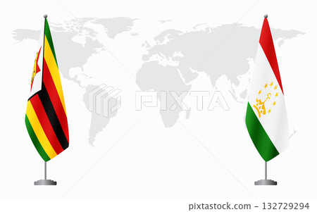 Zimbabwe and Tajikistan flags for official meeting 132729294