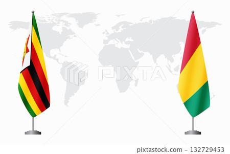Zimbabwe and Guinea flags for official meeting 132729453