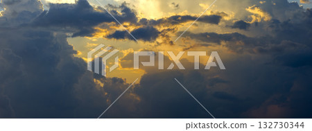 Amazing evening skyscape. Sunset sky with bright colorful clouds 132730344