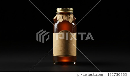 Amber liquid in glass bottle with blank label and gold cap on black background 132730363