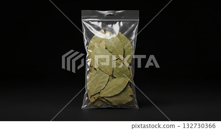 Bay Leaves in Clear Plastic Bag on Dark Background, Culinary Herb Packaging 132730366