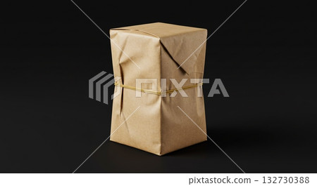 Brown Paper Wrapped Package on Black Background Brown Paper Wrapped Package on Black Background 132730388
