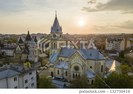 Aerial view of urban area in Ivano-Frankivsk city, Ukraine. Big building of old historic church in rural suburbs. Aerial view of urban area in Ivano-Frankivsk city, Ukraine. Big building of old historic church in rural suburbs. 132730419