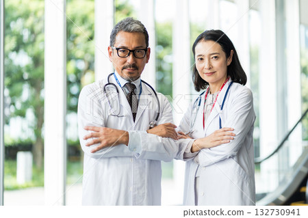 Middle-aged and senior male and female medical professionals. 132730941