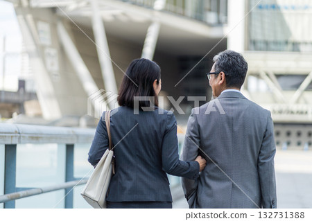 Middle-aged and senior business people, both male and female. Middle-aged and senior business people, both male and female. 132731388