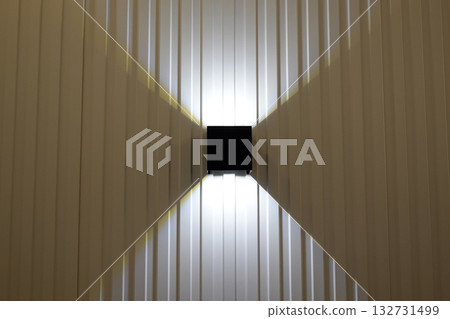 Wall Sconce Lighting on Metal Wall                                132731499