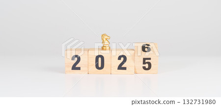 Happy New Year 2025 change to 2026 year block with horse chess. Year of the Horse, animals of the Chinese zodiac, horoscope, success and good fortune 132731980