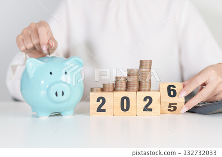 2025 end year to Happy New Year 2026 with piggy bank. Resolution, Goals, Plan, Action, Money Saving, Retirement fund, Pension, Investment and Financial concepts 2025 end year to Happy New Year 2026 with piggy bank. Resolution, Goals, Plan, Action, Money Saving, Retirement fund, Pension, Investment and Financial concepts 132732033