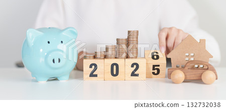 2025 end year to Happy New Year 2026 with car and Home model with coin stack. Car loan, Interest rate, real estate, house, Insurance, Financial, Repair, Tax, mortgage and Maintenance 132732038