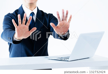 Man making a reluctant stop gesture 132732424