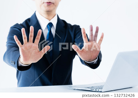 Man making a reluctant stop gesture 132732426