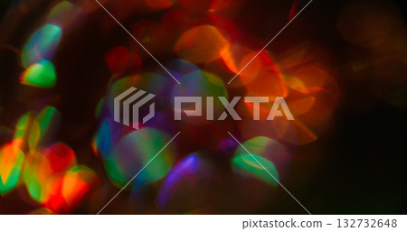 Blur glare. Gradient reflection. Abstract colorful glow circles on dark background. Red blue green holographic bright neon optic effect . Blur glare. Gradient reflection. Abstract colorful glow circles on dark background. Red blue green holographic bright neon optic effect . 132732648