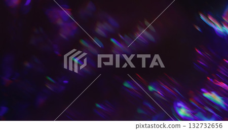 Defocused lens prism. Holographic glow leak. Spectrum color twinkle on night background. Purple red green neon blur abstract flash. Defocused lens prism. Holographic glow leak. Spectrum color twinkle on night background. Purple red green neon blur abstract flash. 132732656